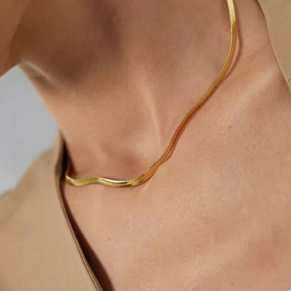 Gold plated herringbone snake chain necklace. 4mm in width.